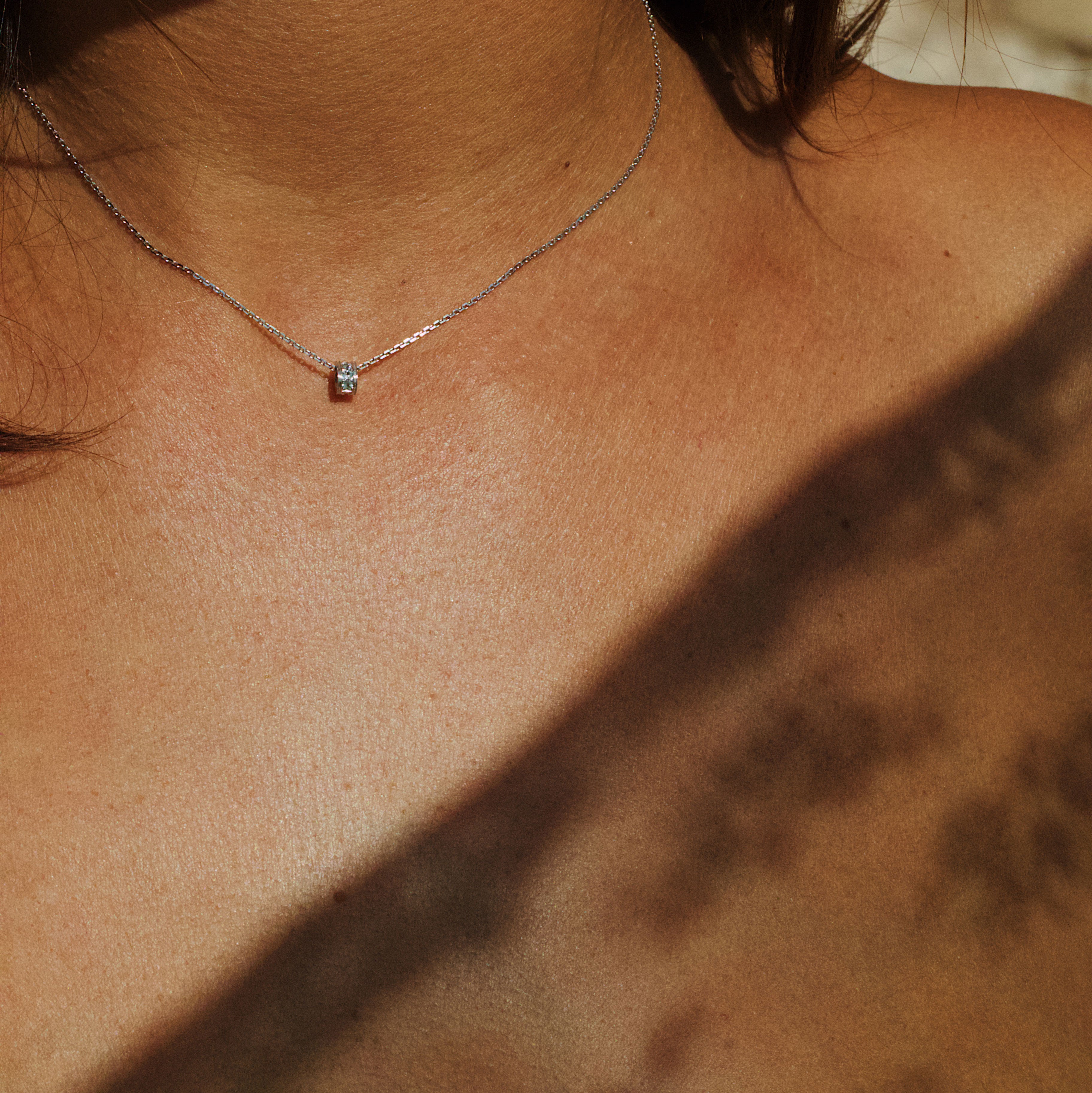 The “Gram” necklace, White gold, blue sapphires 