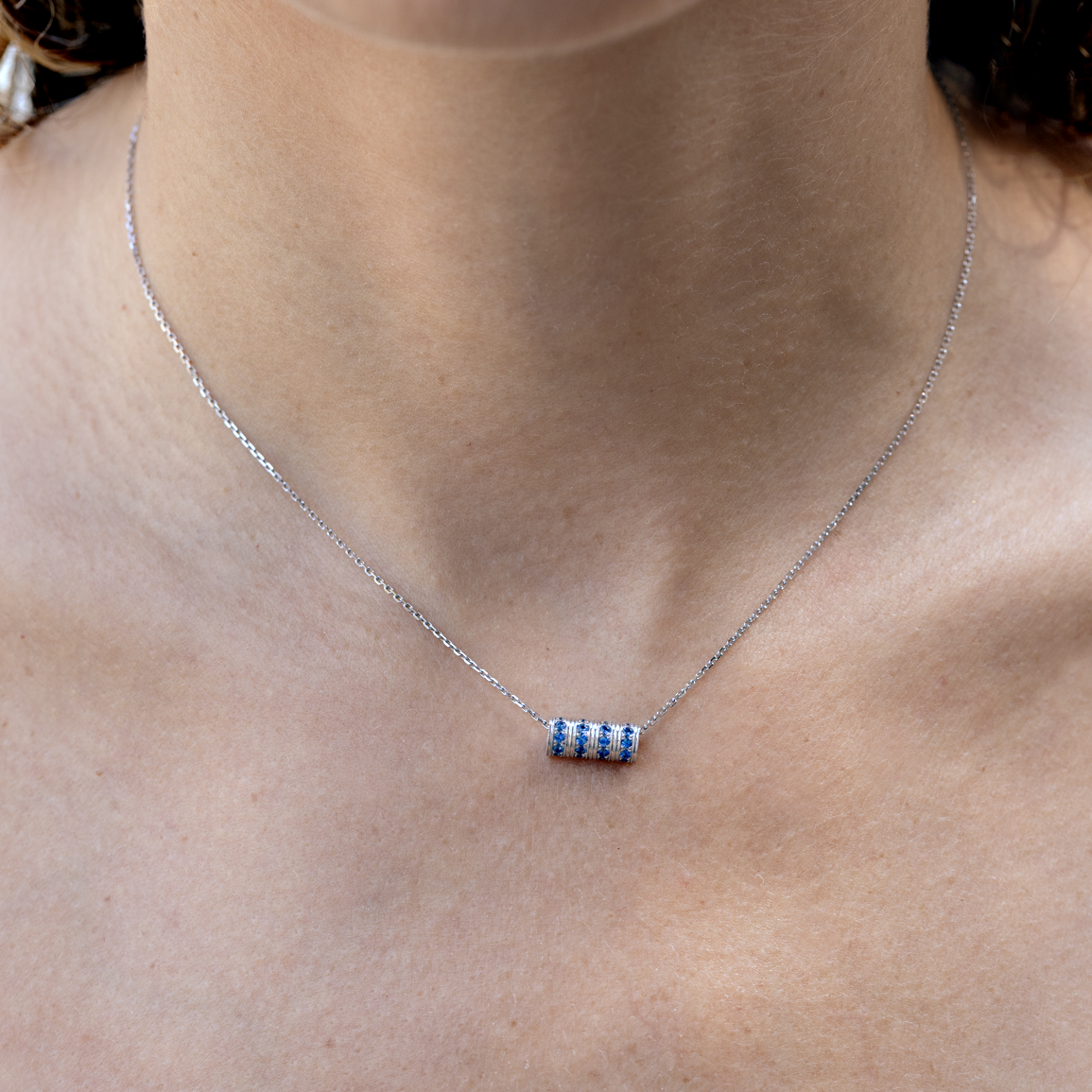 The “4 Grams” necklace, Topaz